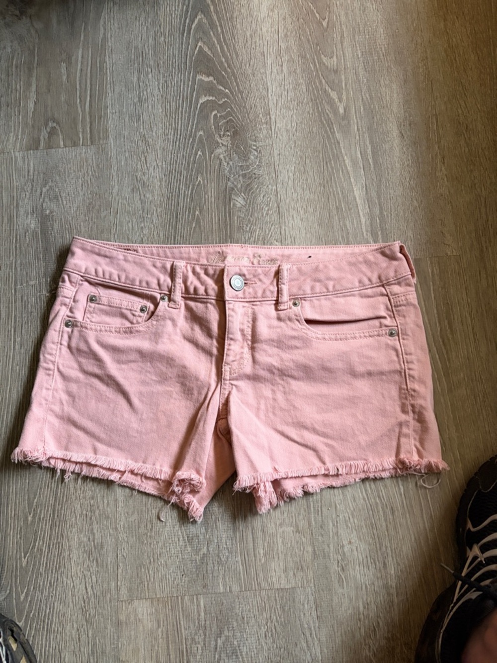 Pink American Eagle shorts.